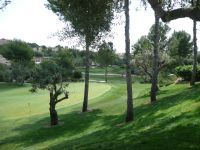 Realgolf de Bendinat Putting Green Grüne Fläche Wiese und Bäumen